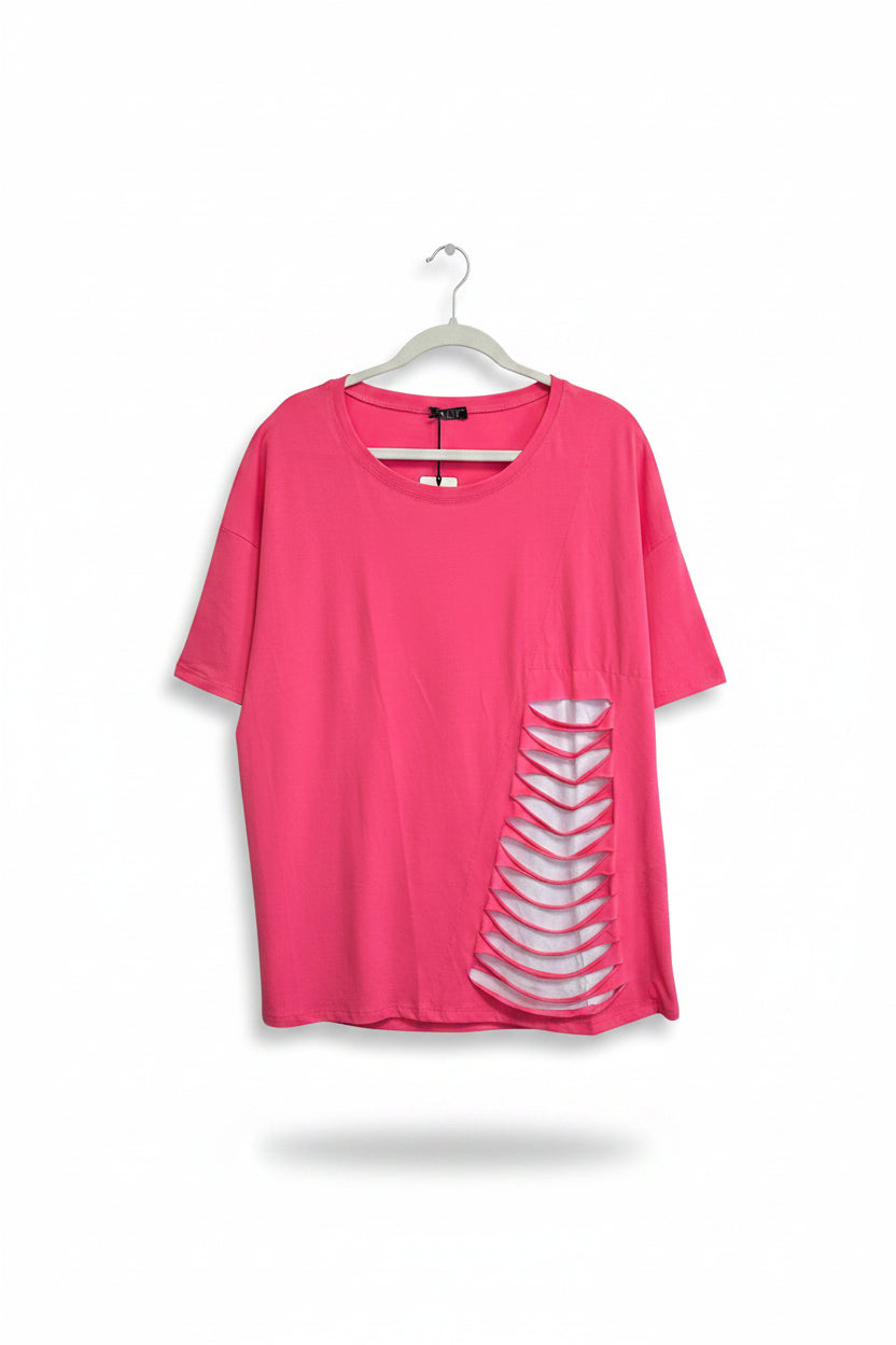 Pink t-shirt with white graphics on a metallic surface